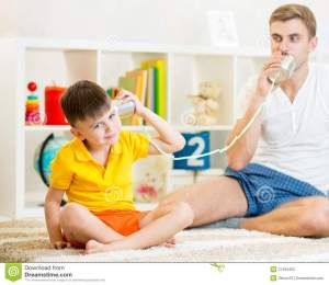 child-father-having-phone-call-tin-cans-plays-57455452